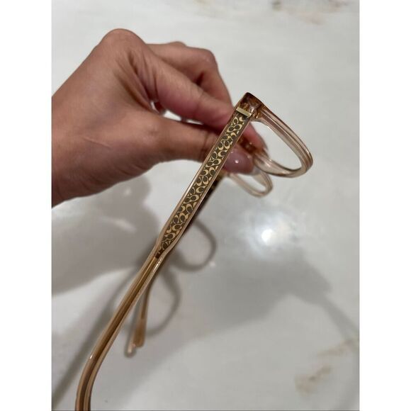Coach Signature “C” print glasses frame in transparent peach main image 9